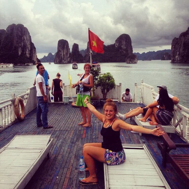 2 people on a boat in Halong bay Vietnam